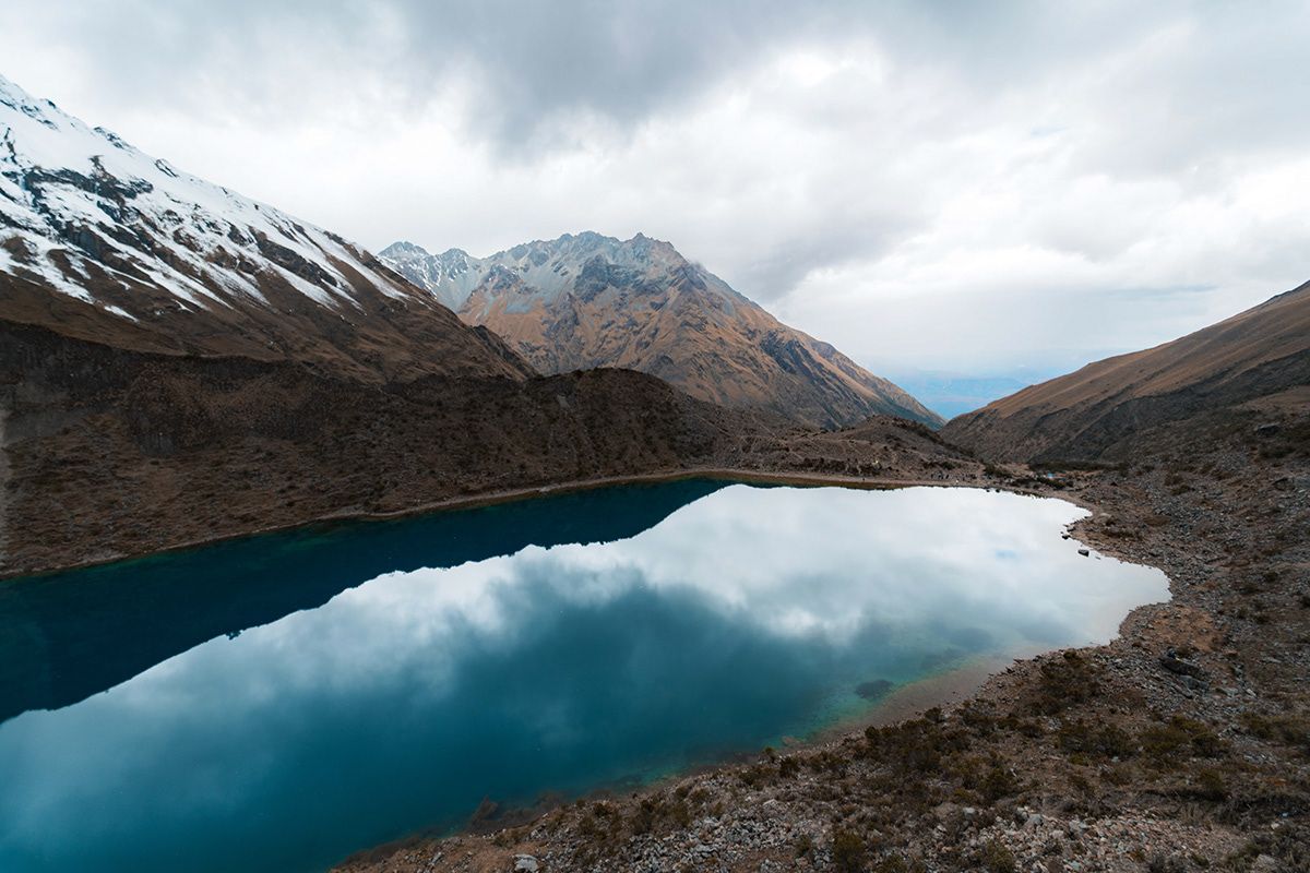 Turquoise glacial lake below Salkantay, Peru